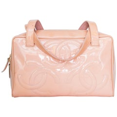 A 1990s Vintage Pink Chanel Paten Leather Handbag