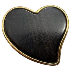 A 1990s Yves Saint Laurent Wood and Brass Heart Brooch