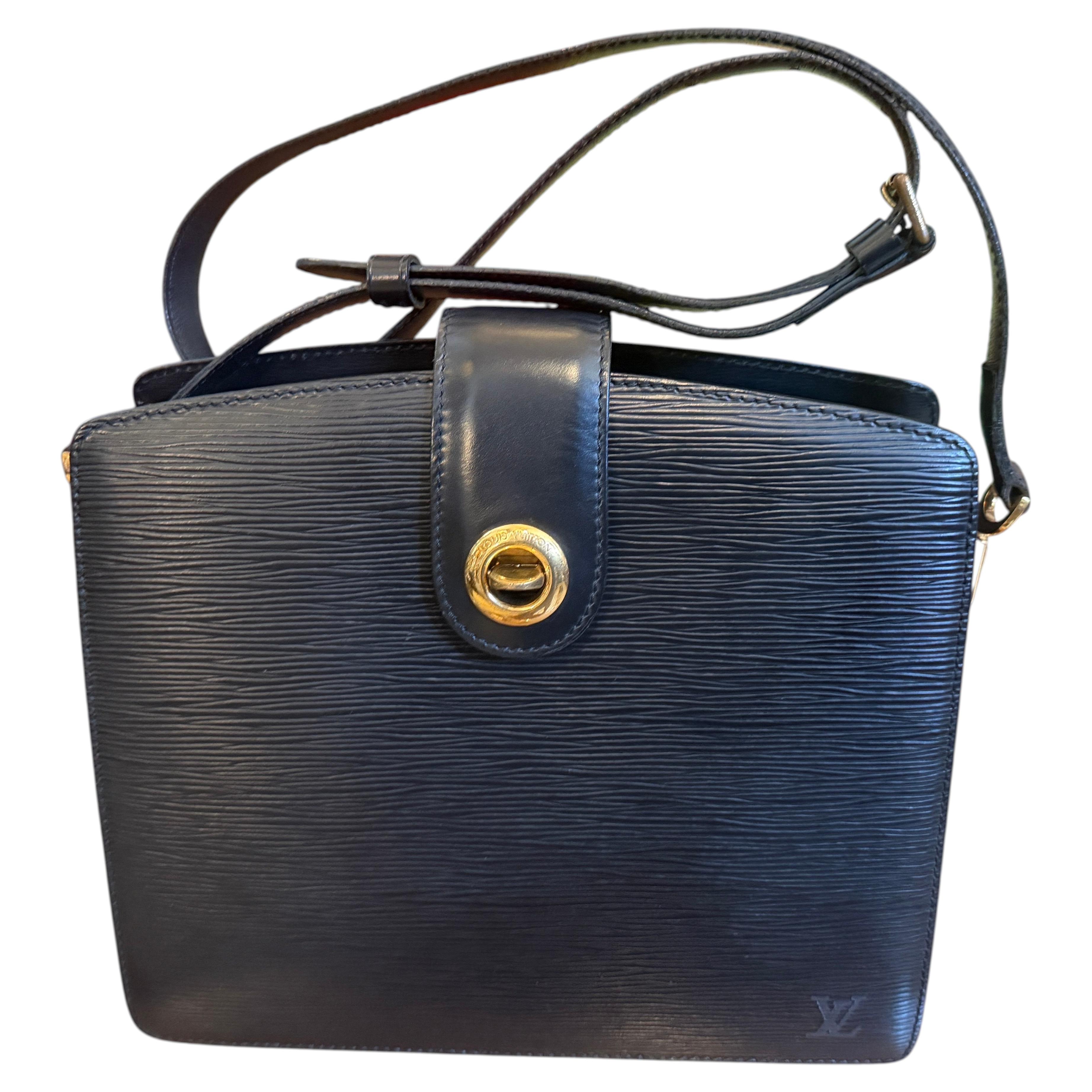 A 1993 Vintage Louis Vuitton Black Epi Leather Capucines Shoulder Bag For Sale