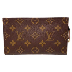 A 1999 Vintage Louis Vuitton Coated Canvas Monogram Pouch