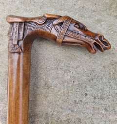 A 19th C antique walking stick with an equestrian racehorse carved handle C 1870
