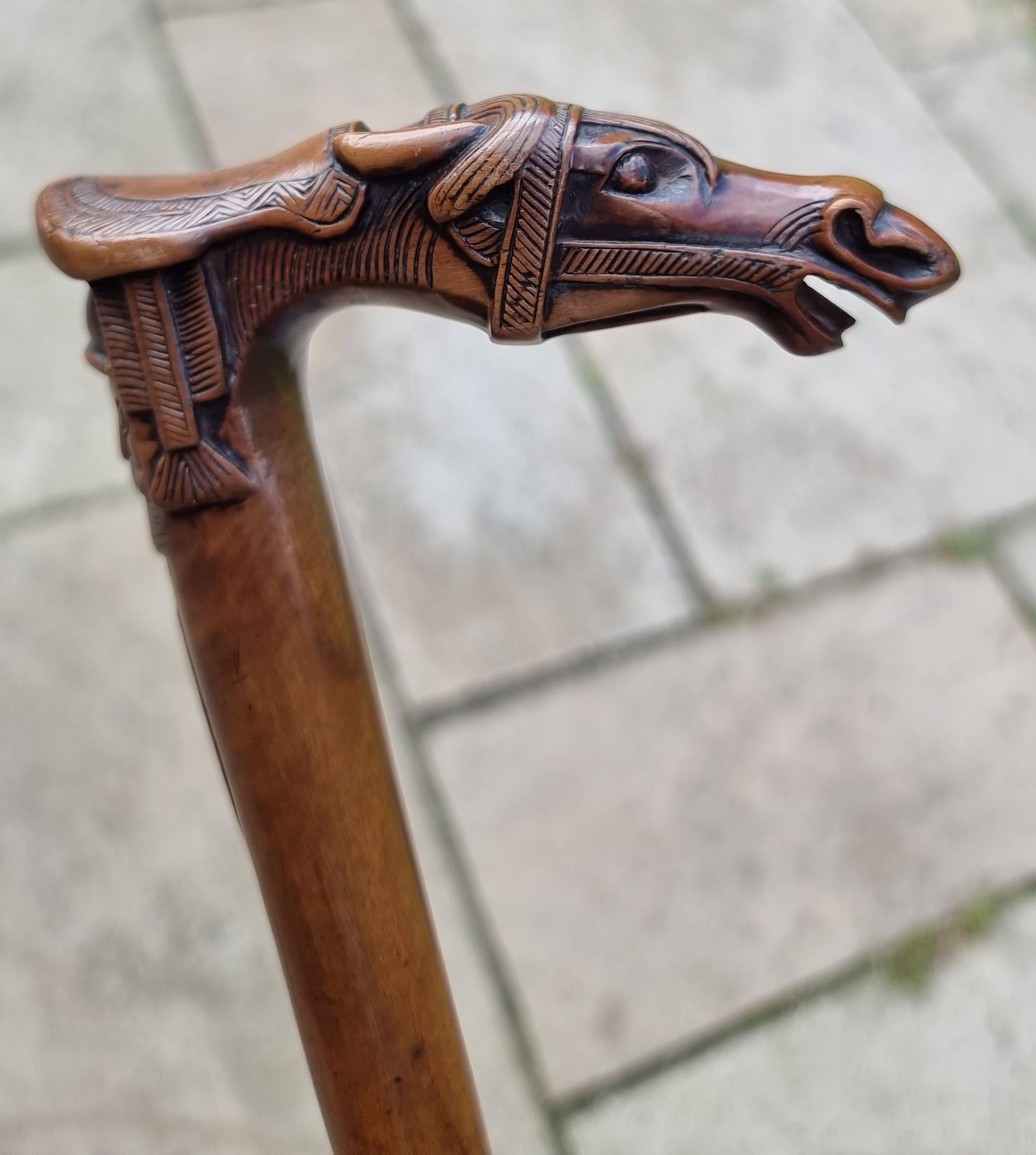 19th Century A 19th C antique walking stick with an equestrian racehorse carved handle C 1870