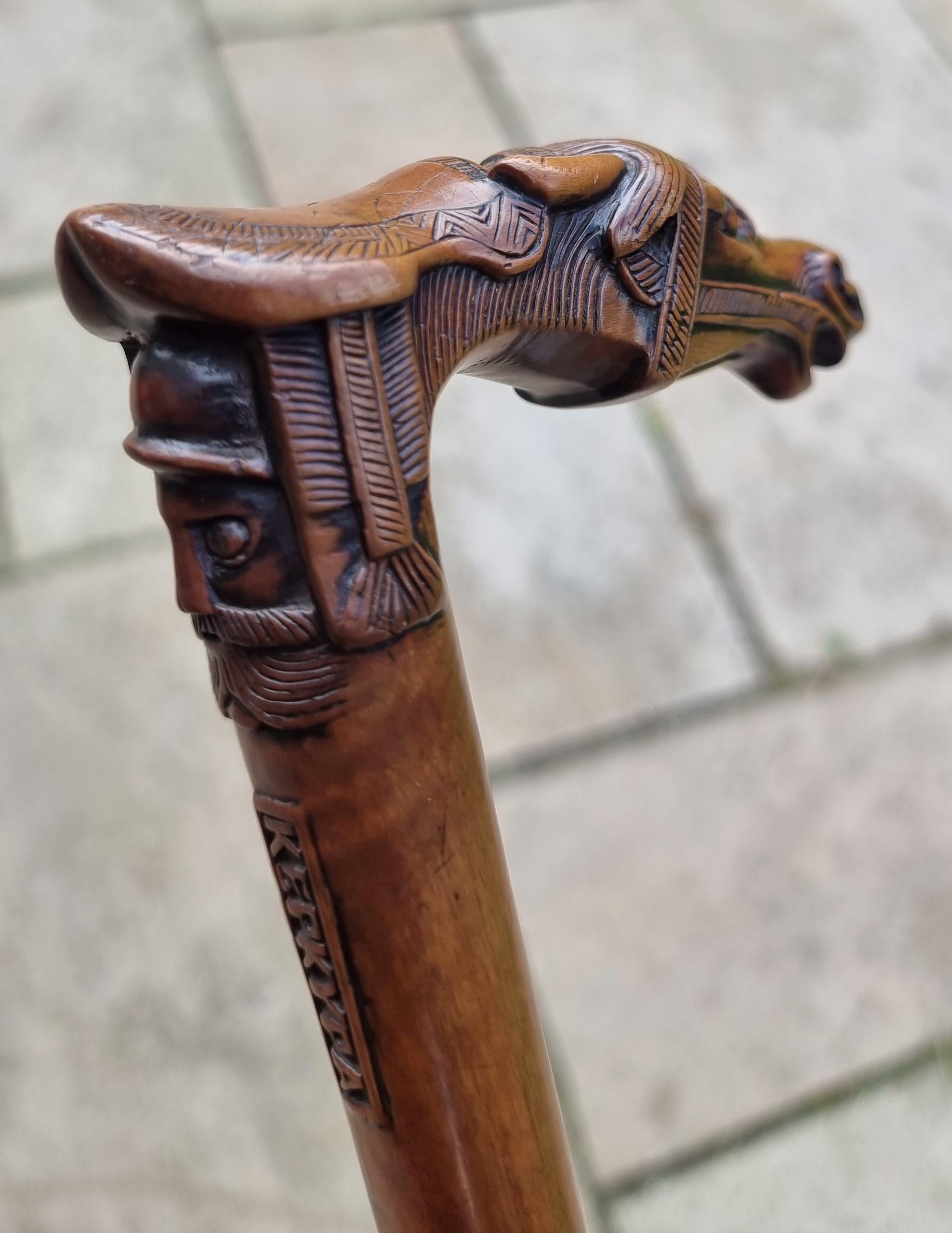 Wood A 19th C antique walking stick with an equestrian racehorse carved handle C 1870