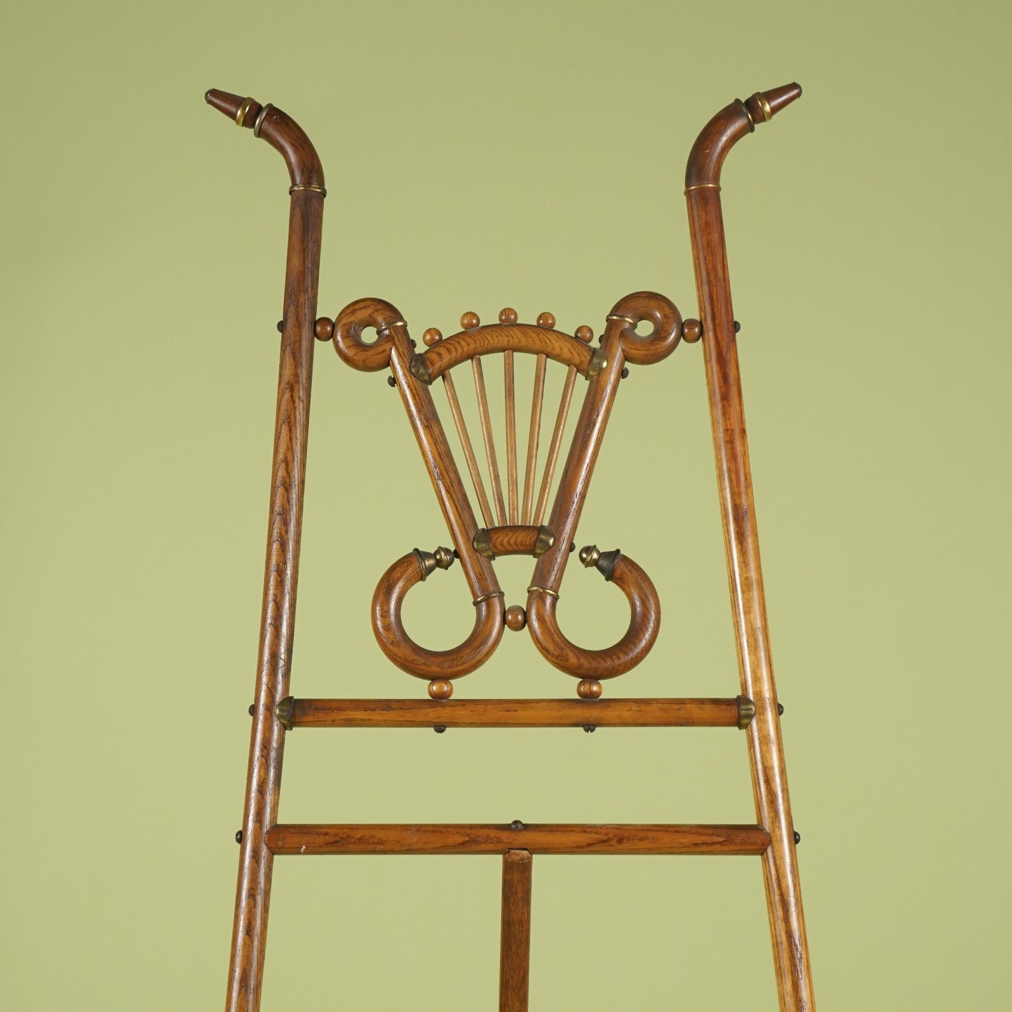 This rare surviving Aesthetic Movement easel comes from the estate of the renowned Sir John Richardson and can be seen in the book published regarding his homes and life. Crafted by the firm Ferguson Brothers of New York which was established in