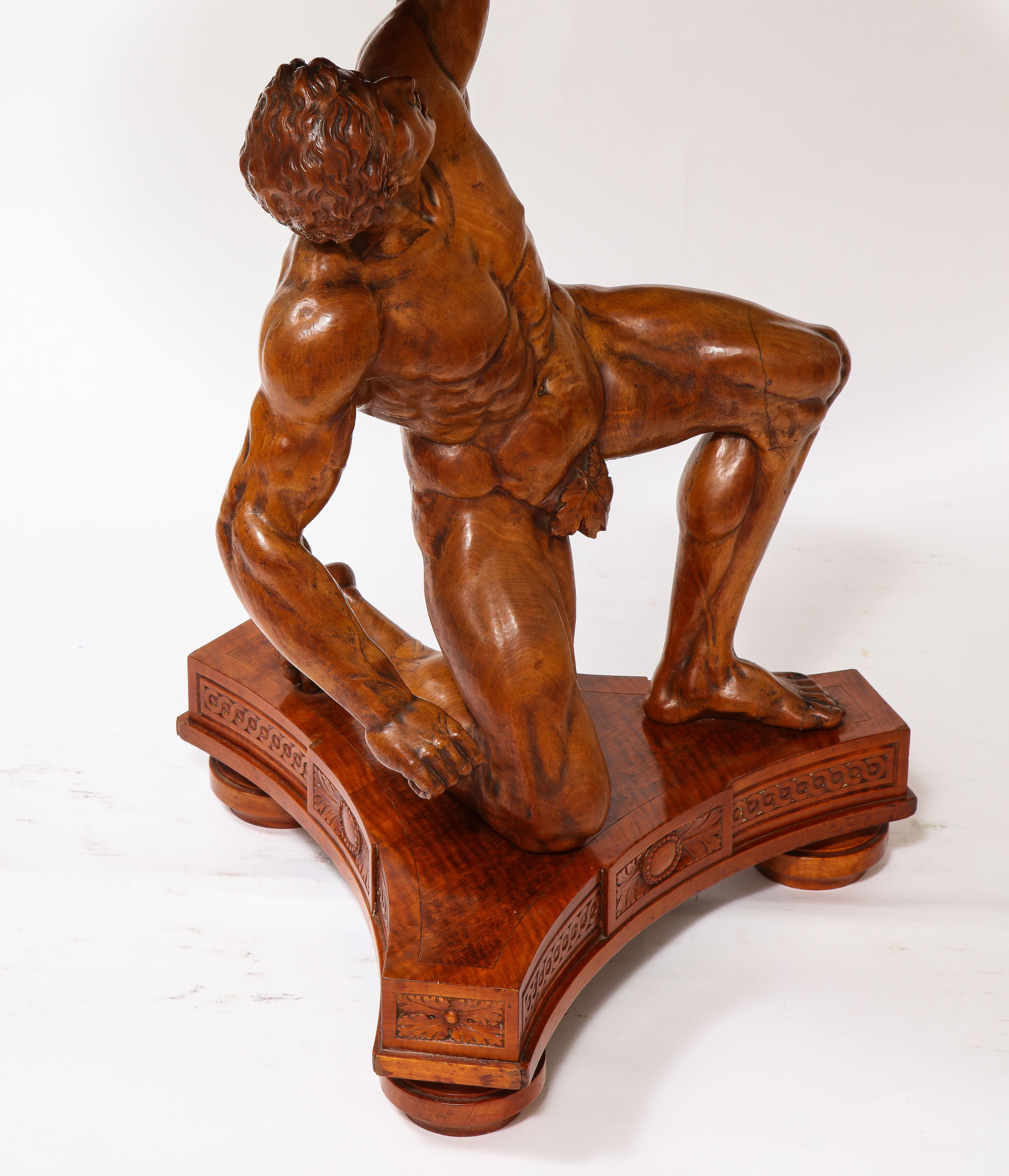 Table centrale Atlas en marqueterie de bois sculpté du 19e siècle, signée J. Plucknett & Co. en vente 4
