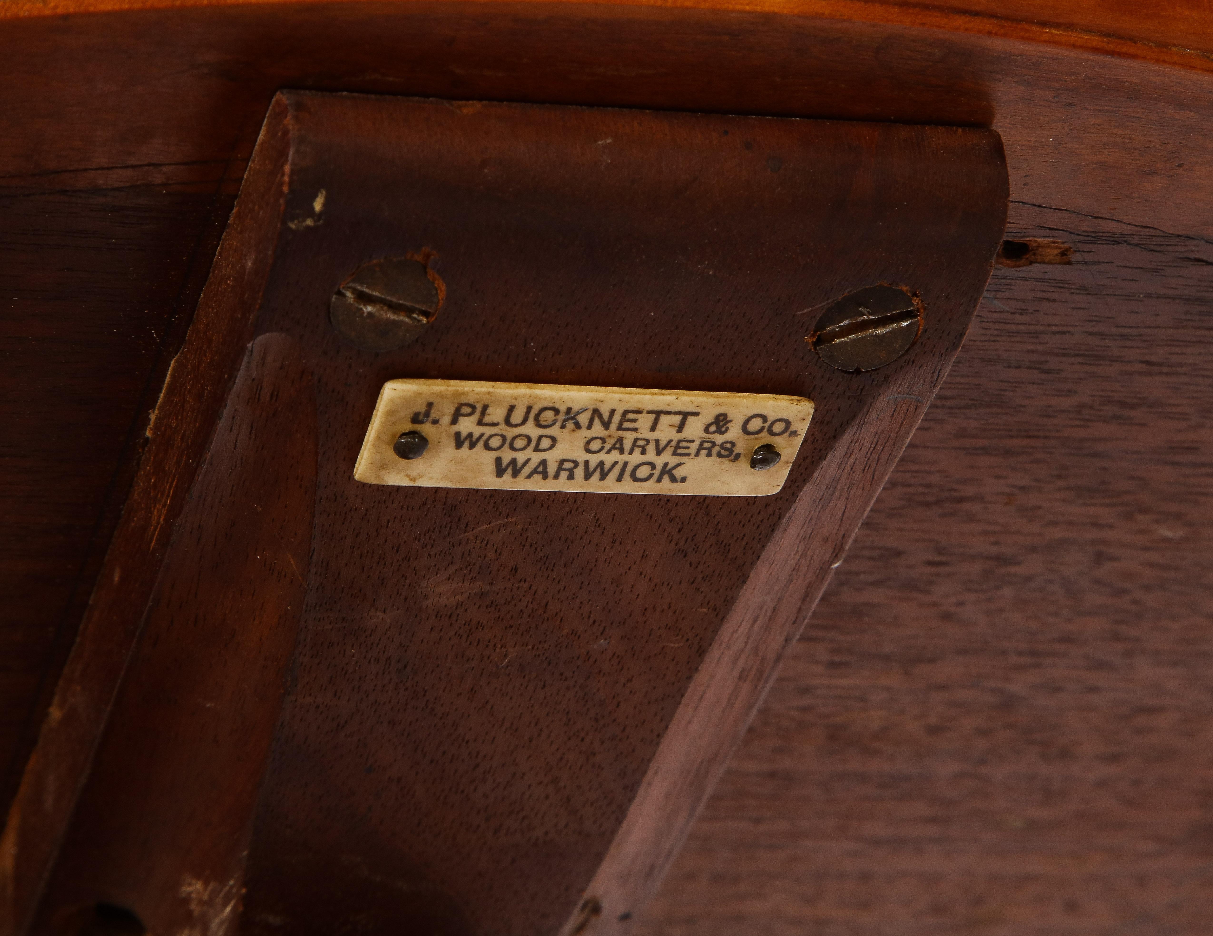 Table centrale Atlas en marqueterie de bois sculpté du 19e siècle, signée J. Plucknett & Co. en vente 11