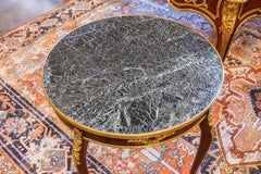 A 19th c French Louis XVI mahogany & gilt bronze mounted table by Baron Paris
