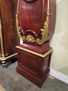 A  19th c French mahogany  and parquetry inlaid Grandfather clock. Gilt bronze