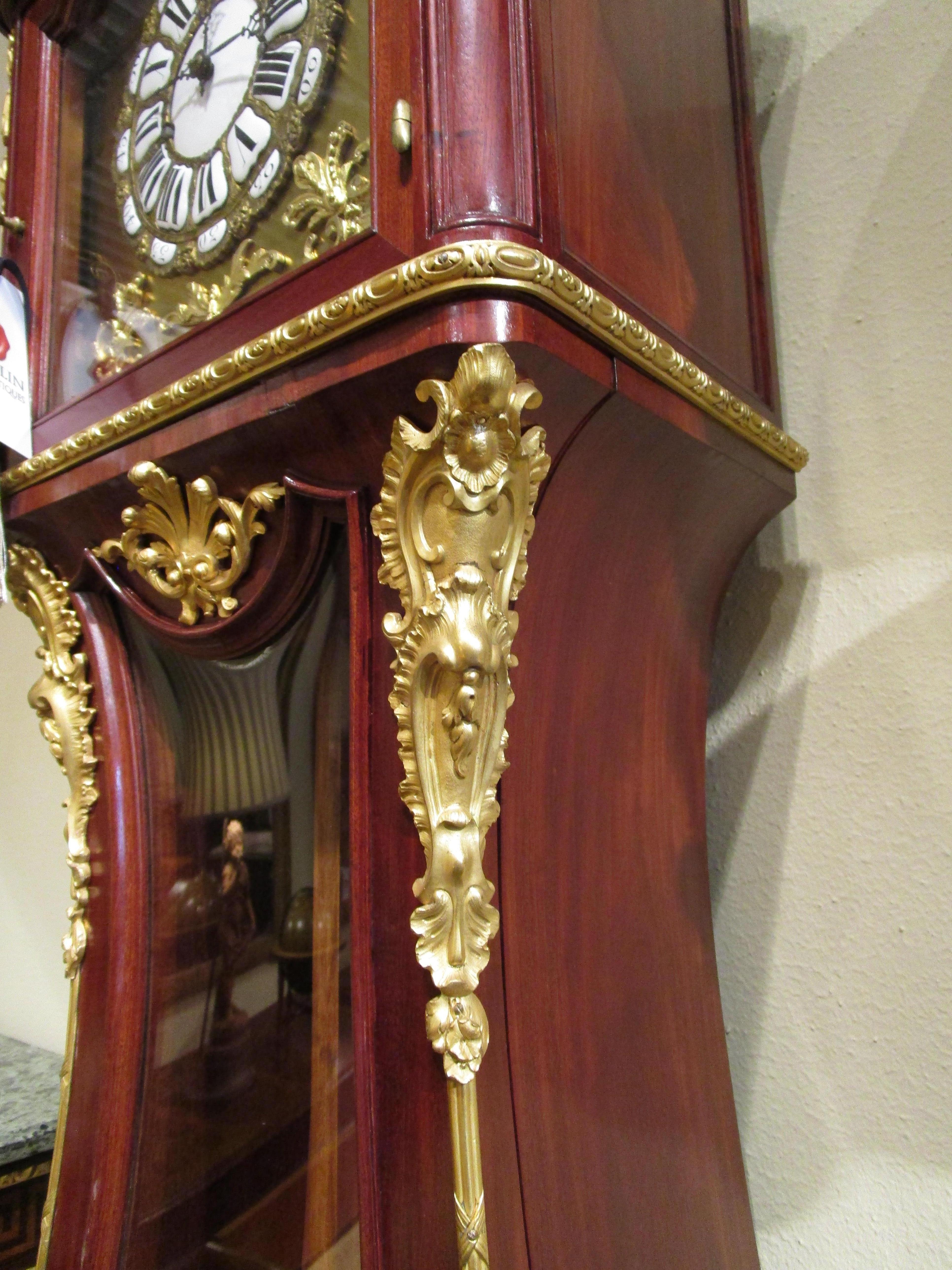 Bronze A  19th c French mahogany  and parquetry inlaid Grandfather clock. Gilt bronze For Sale