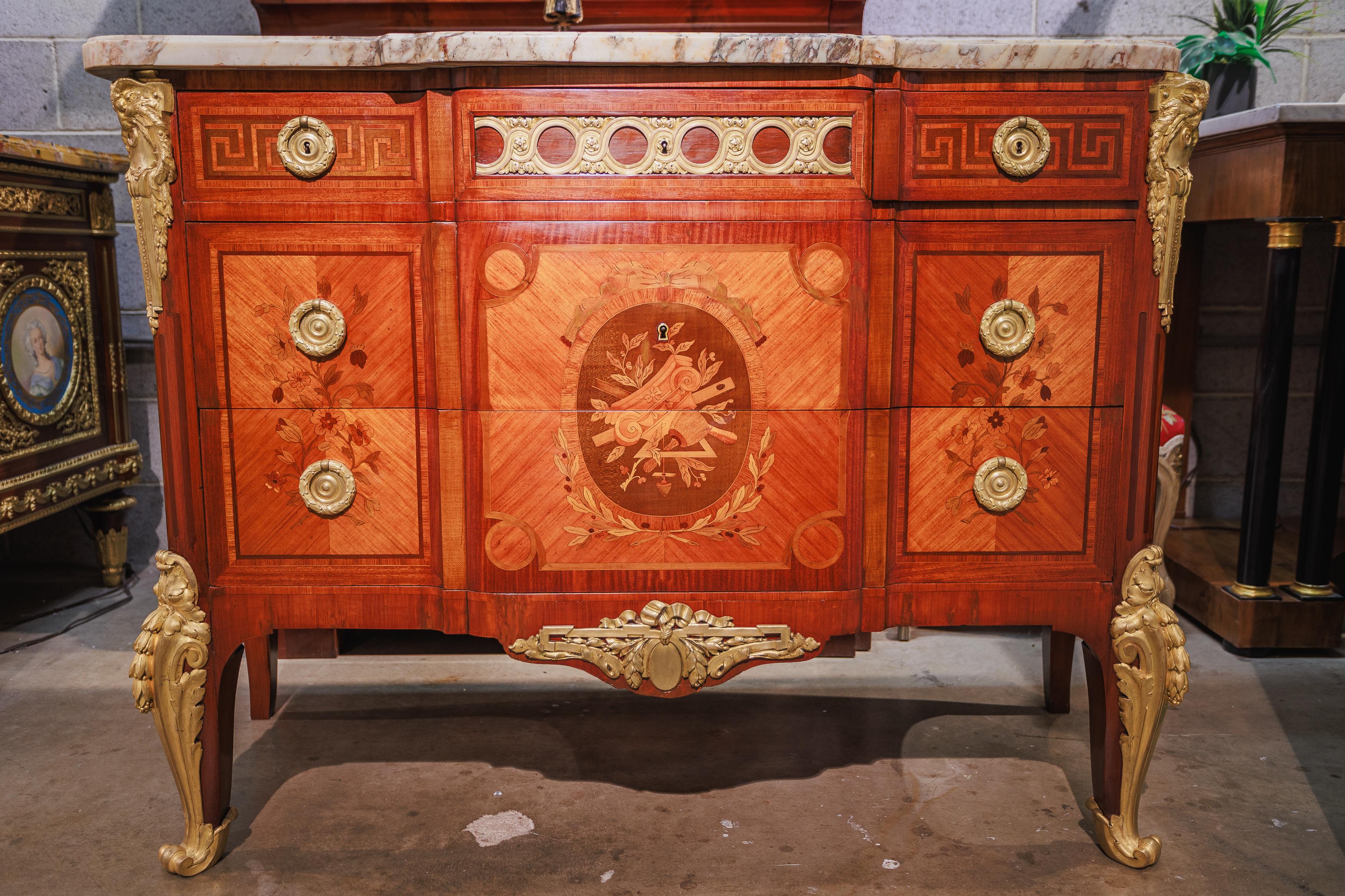 A 19th century French Louis XVI kingwood marquetry inlay and marble top commode . Fine gilt bronze mounts . The bronzes are stamped Henri Picard  ( HP) . 