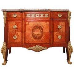 A  Commode française du 19ème siècle en marqueterie et bronze doré signée Henri Picard