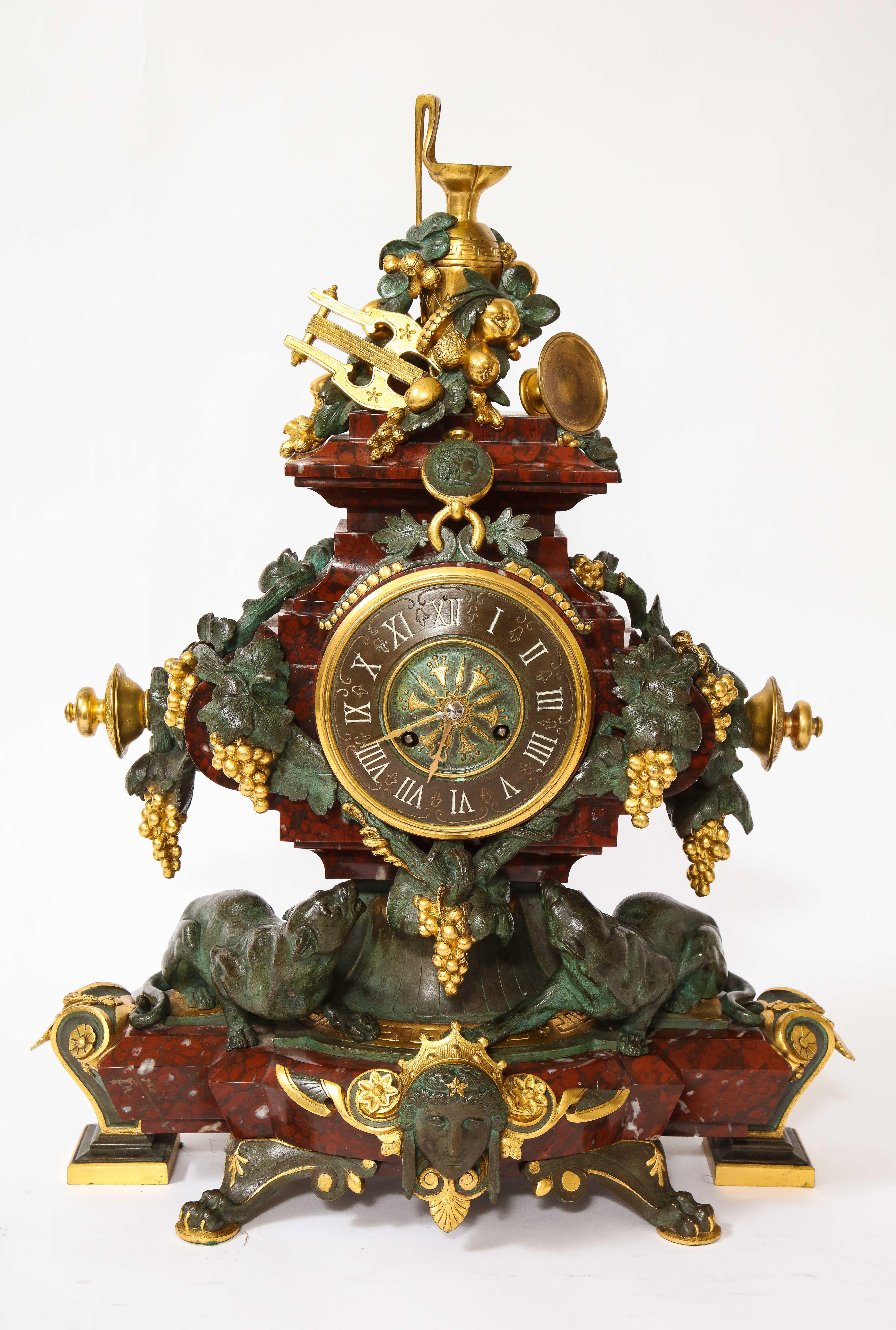 Gilt A 19th C. French Patinated Bronze & Ormolu Mounted Rouge Marble Clock Garniture For Sale
