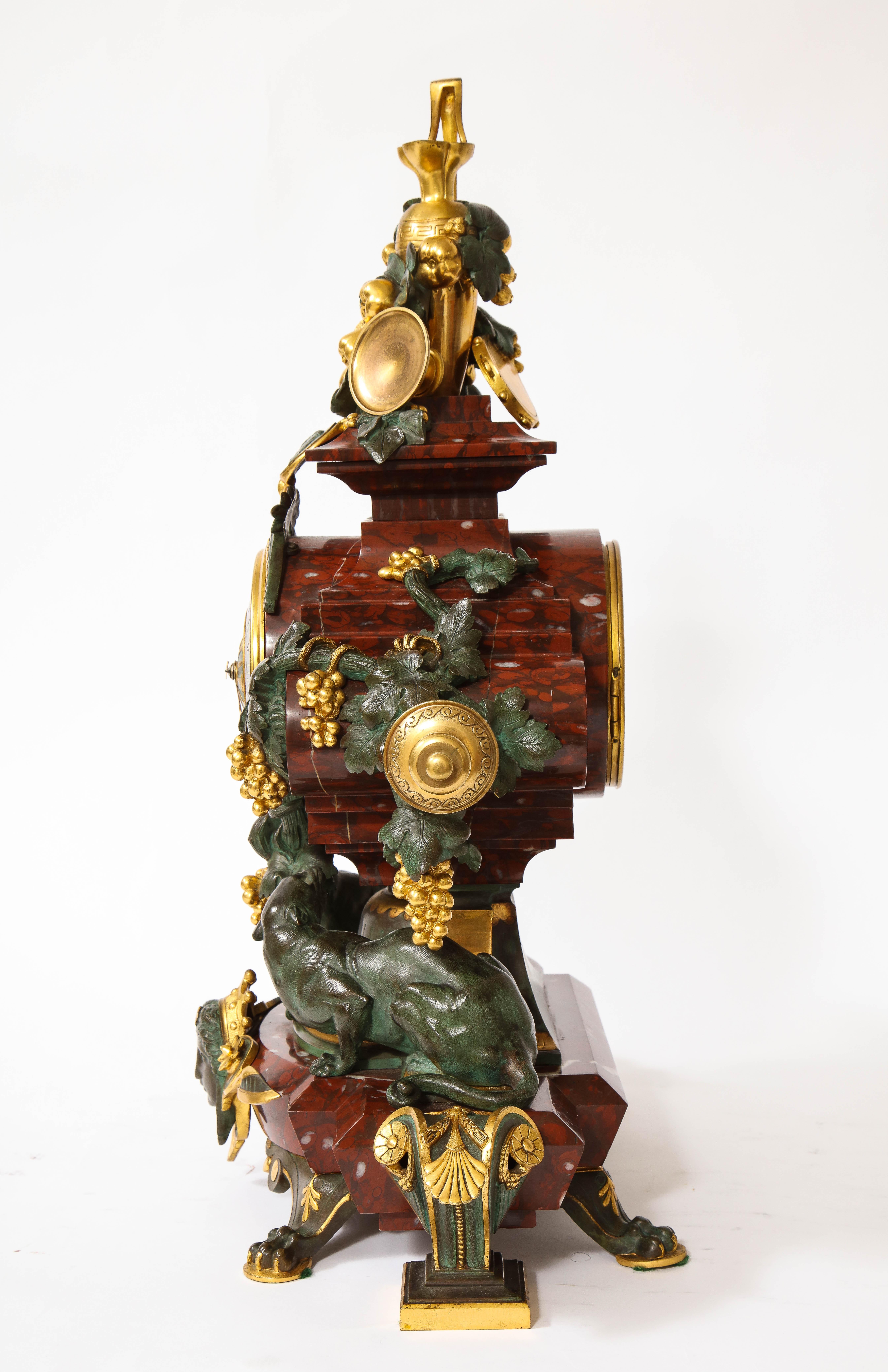 Late 19th Century A 19th C. French Patinated Bronze & Ormolu Mounted Rouge Marble Clock Garniture For Sale