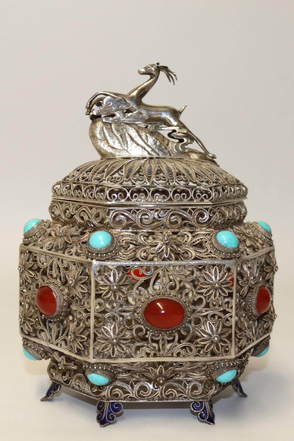 This superb piece of Indian art was created in circa 1900 and is a masterpiece of fine filigree silver work. It is made in two parts of hexagonal form with a push fitting lid which locates perfectly onto the body. It has a finial pediment in the