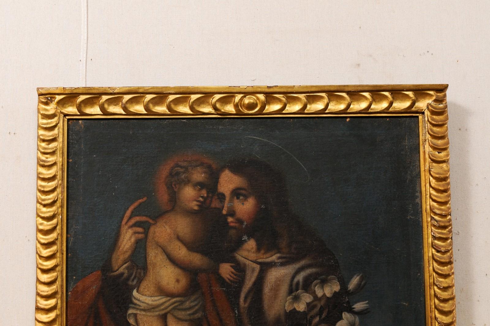 Nord-américain Peinture coloniale espagnole de Jésus avec un enfant, dans un cadre doré du 19ème siècle en vente
