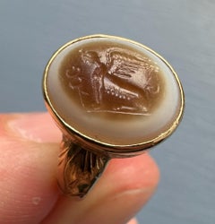 A 19th Cent. Gold Chiseled Ring set with a Roman Sardonyx Intaglio. Sphinx