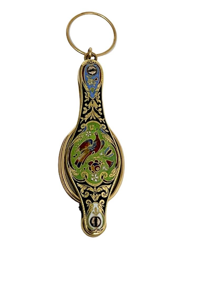 A 19th Century 14kt gold and enamel lorgnette

A lorgnette with a beautiful scene of leaf and flower pattern in gold and enamel with a peacock on the front and a bunch of flowers on the back. The peacock and part of the bunch of flowers are