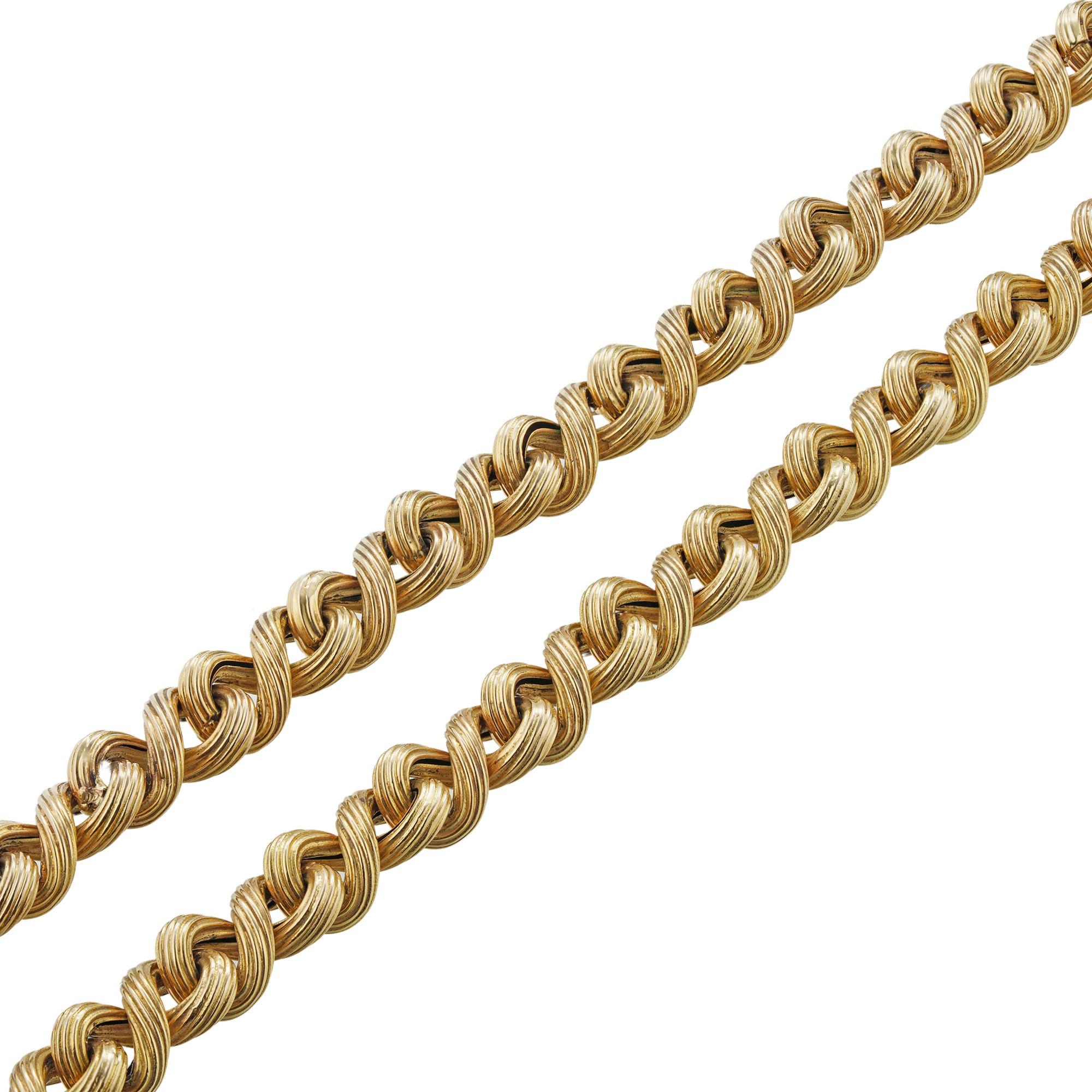 A 19th Century 18ct gold link chain, with textured figure of eight links, all in yellow gold, circa 1880, length 114cm, width 0.6cm, gross weight 44.14 grams.

This chain is in very good condition. Unmarked tested as 18ct Gold. 

A sophisticated