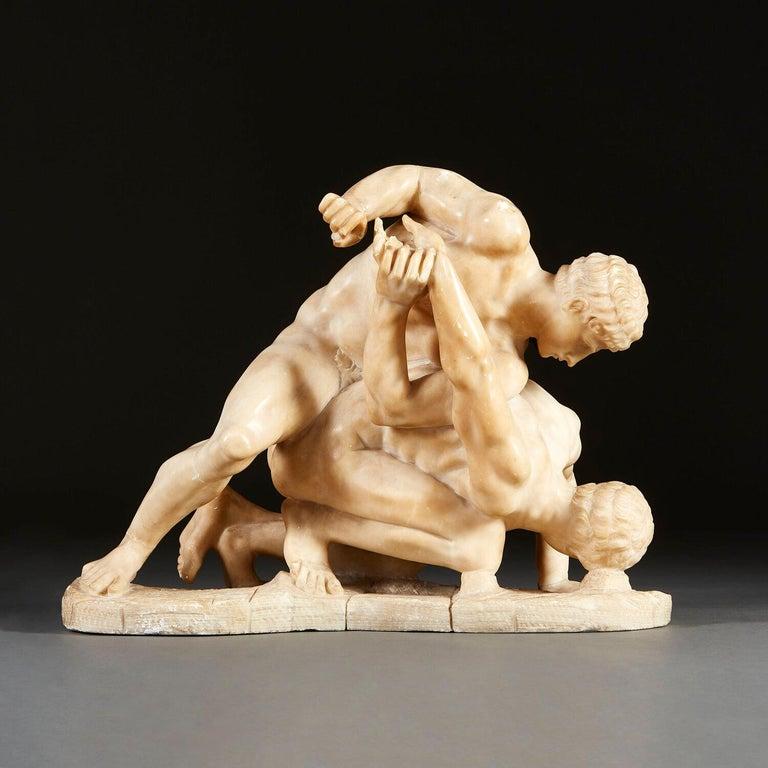 A late nineteenth century alabaster sculpture of two warriors wrestling, after the Roman marble sculpture The Wrestlers.

In 1583, a group of classical sculptures were uncovered near Porta San Giovanni, in Rome. During the 1st century B.C., the