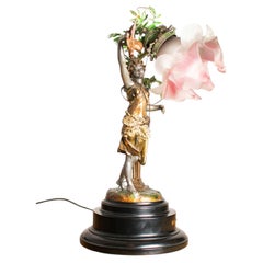 A 19th century Art Nouveau Spelter Figural Woman Table Lamp