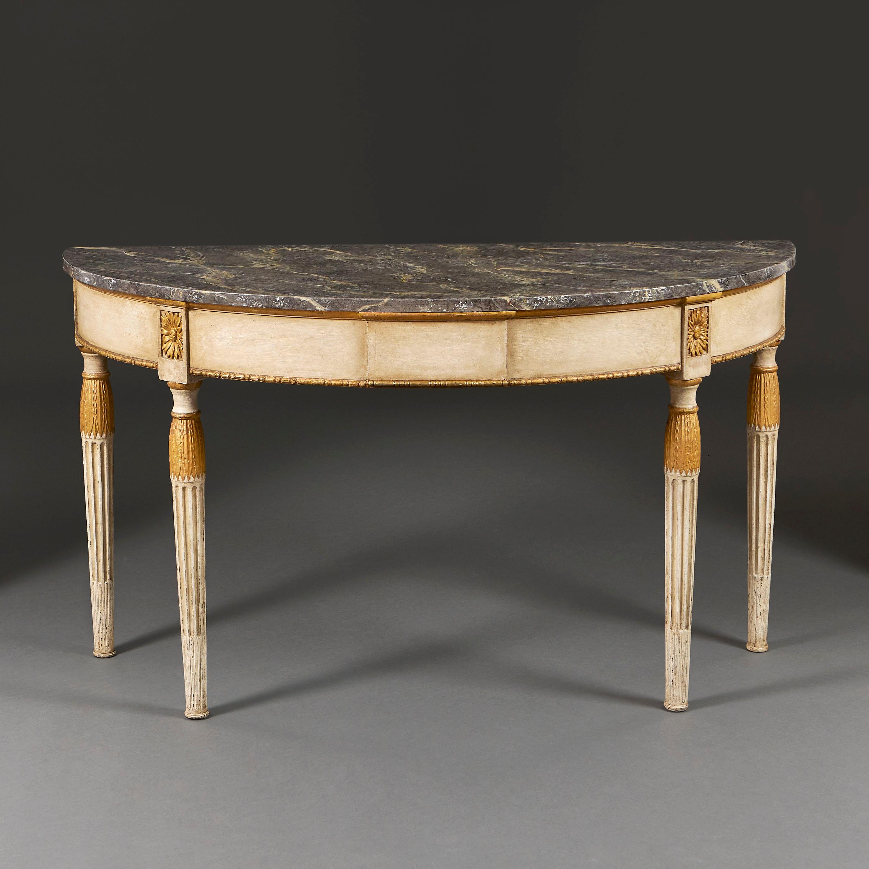 Baltic, circa 1820

An early nineteenth century Baltic pier table, with painted white frieze, inset gilded paterae and mouldings throughout, supported on four fluted legs decorated with stylised acanthus, the top painted to simulate a grey veined