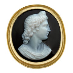 A 19th century banded agate cameo and gold ring