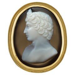 A 19th century banded agate cameo and gold ring