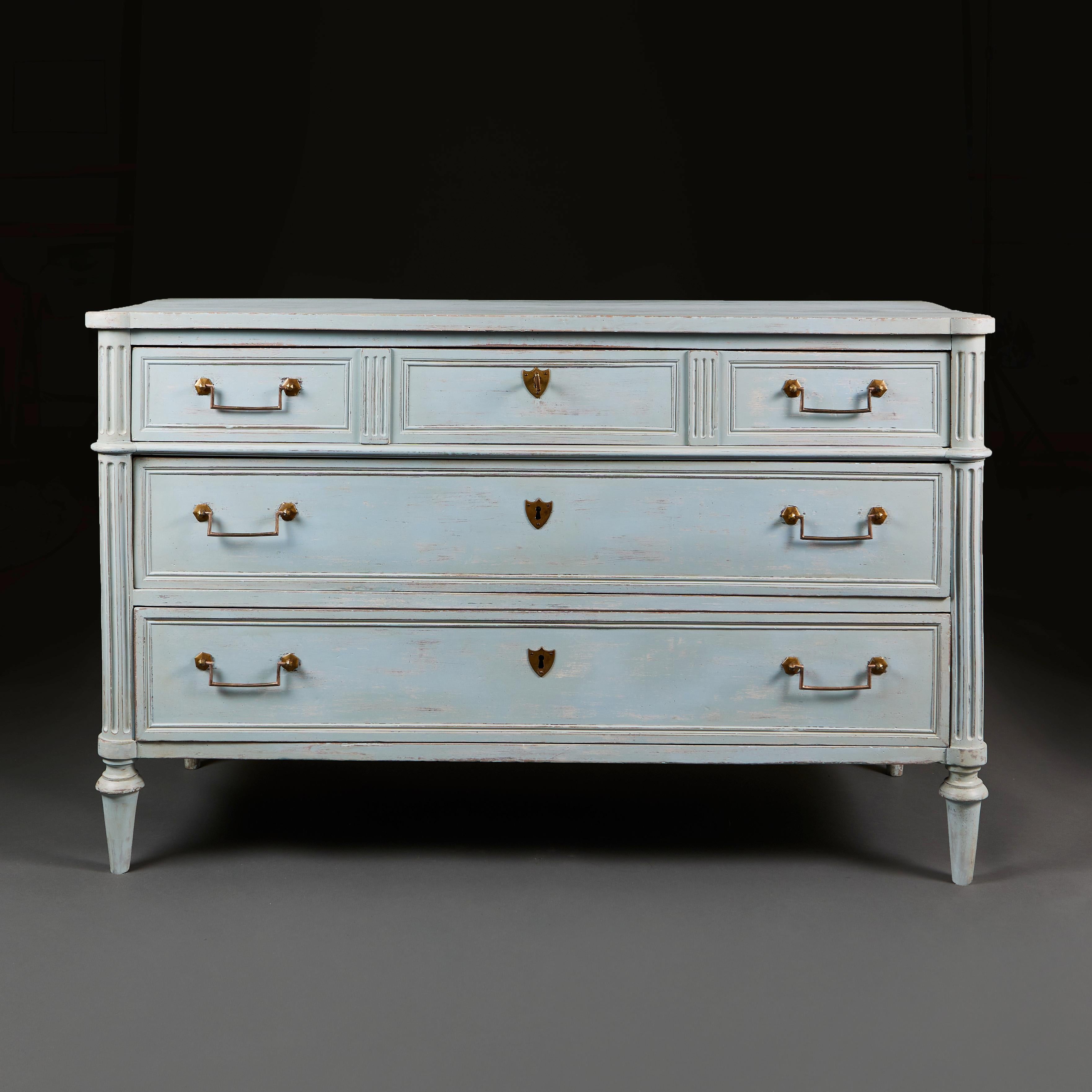 France, circa 1880

A late nineteenth century chest of drawers, with light blue painted surface, opening with three long drawers to the front with brass shield escutcheons, with gadrooned uprights terminating in tapering legs.

Measures: Height