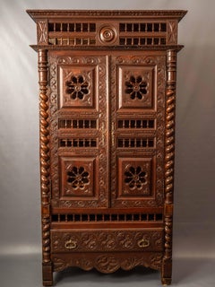 A 19th century Breton cabinet. Master carving
