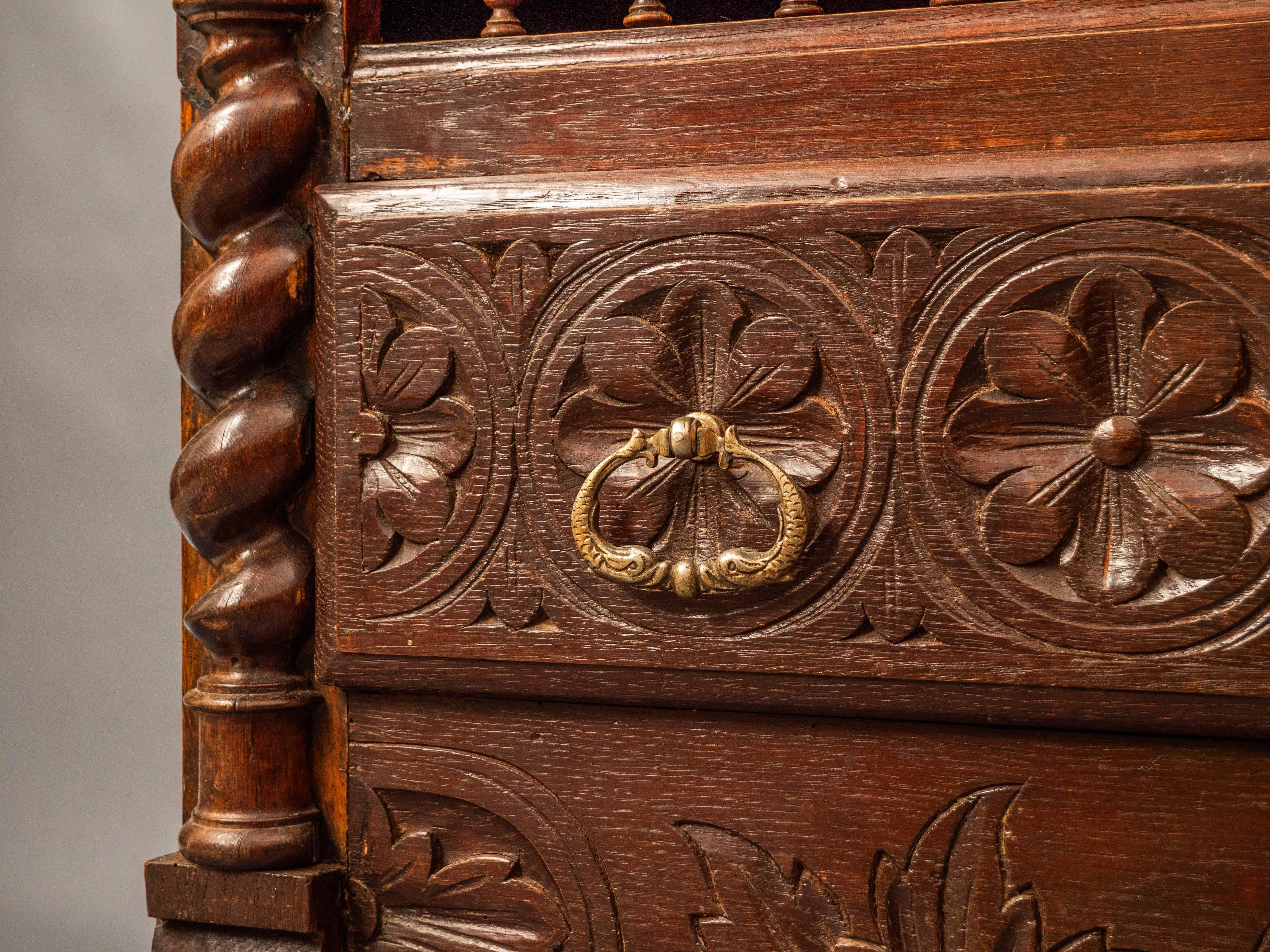 Oak A 19th century Breton cabinet. Master carving For Sale