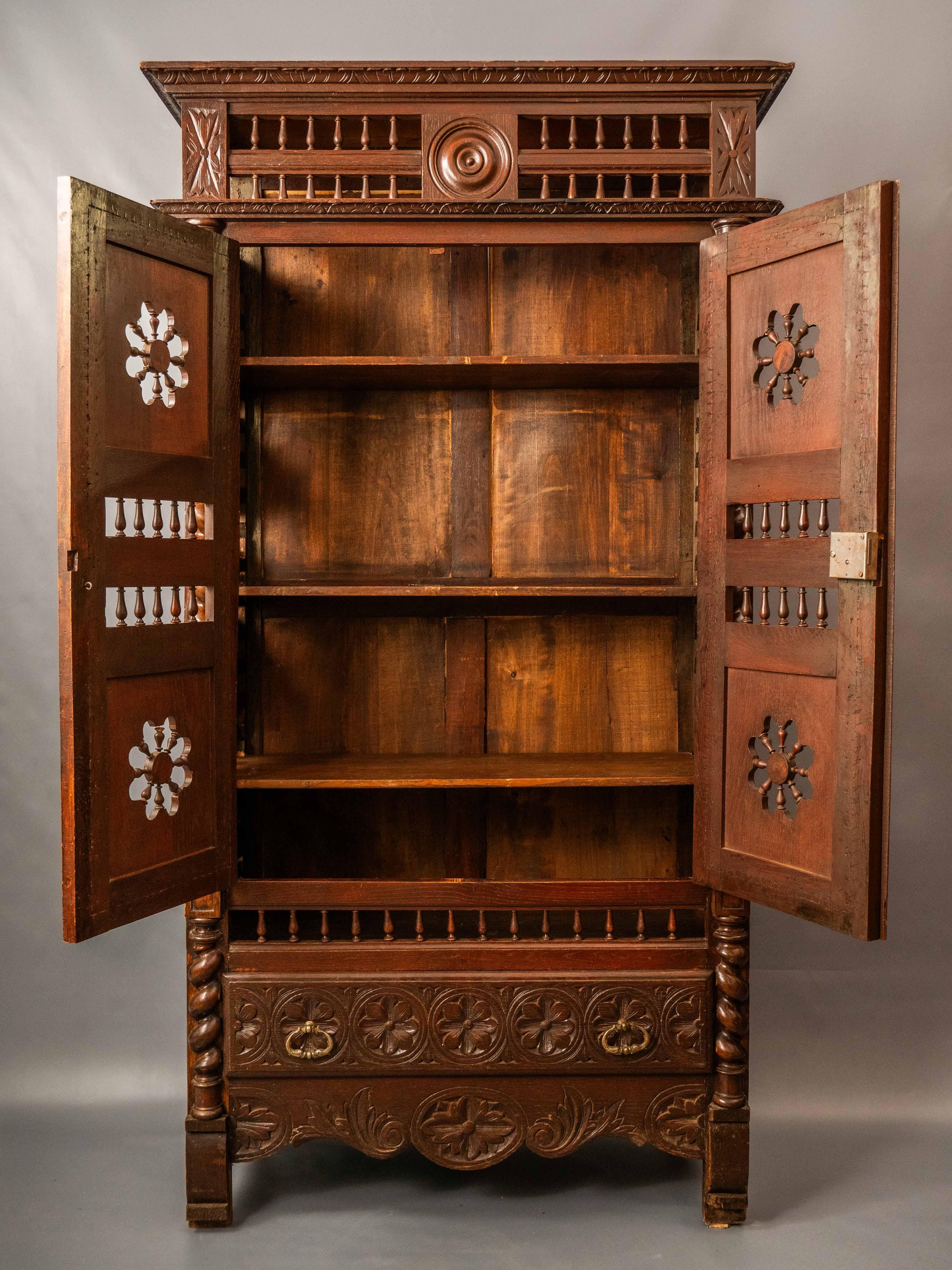 A 19th century Breton cabinet. Master carving For Sale 1