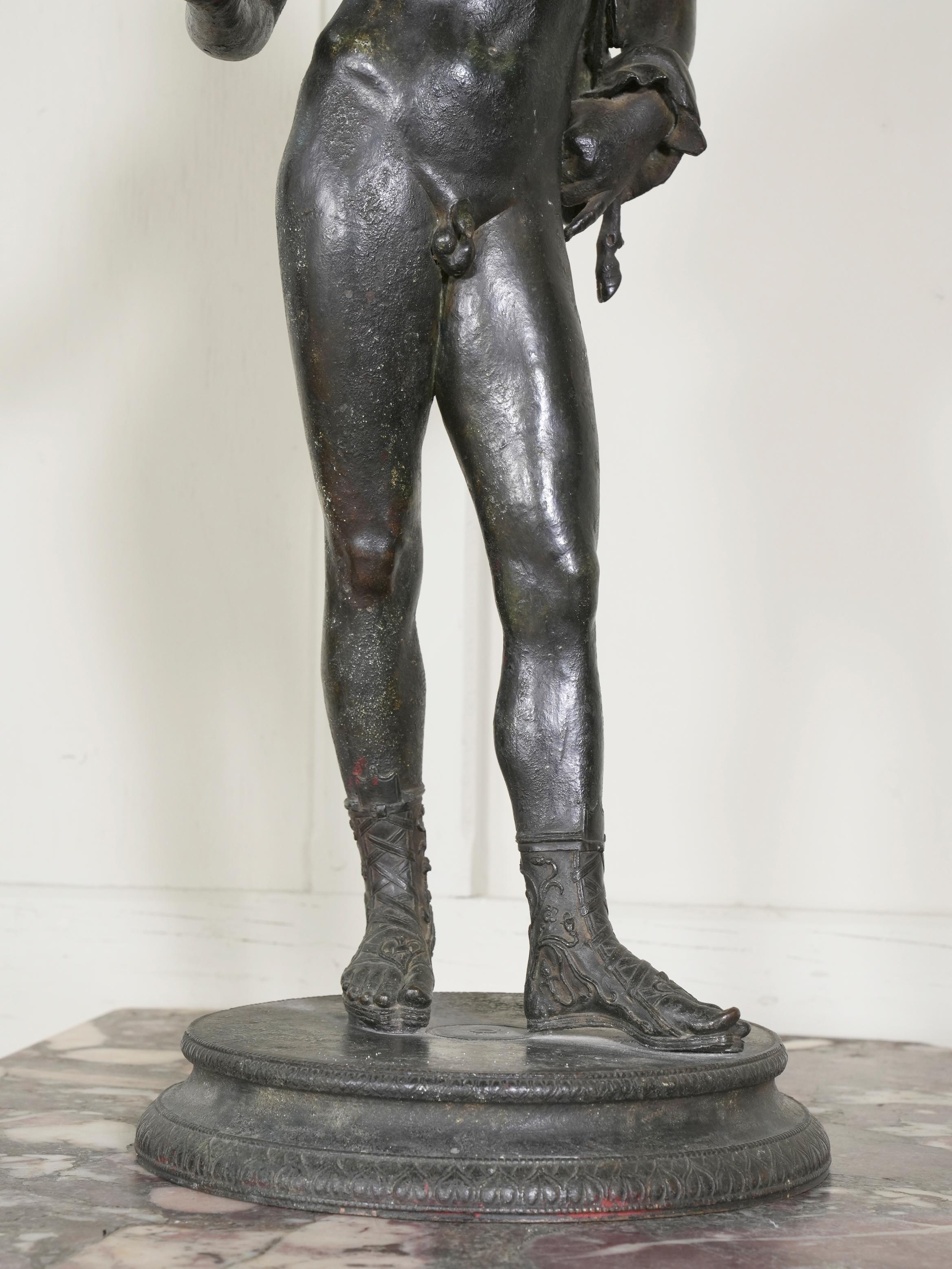 A large Neapolitan bronze of Narcissus, after the antique by Sabatino De Angelis & Fils foundry. 

Signed 