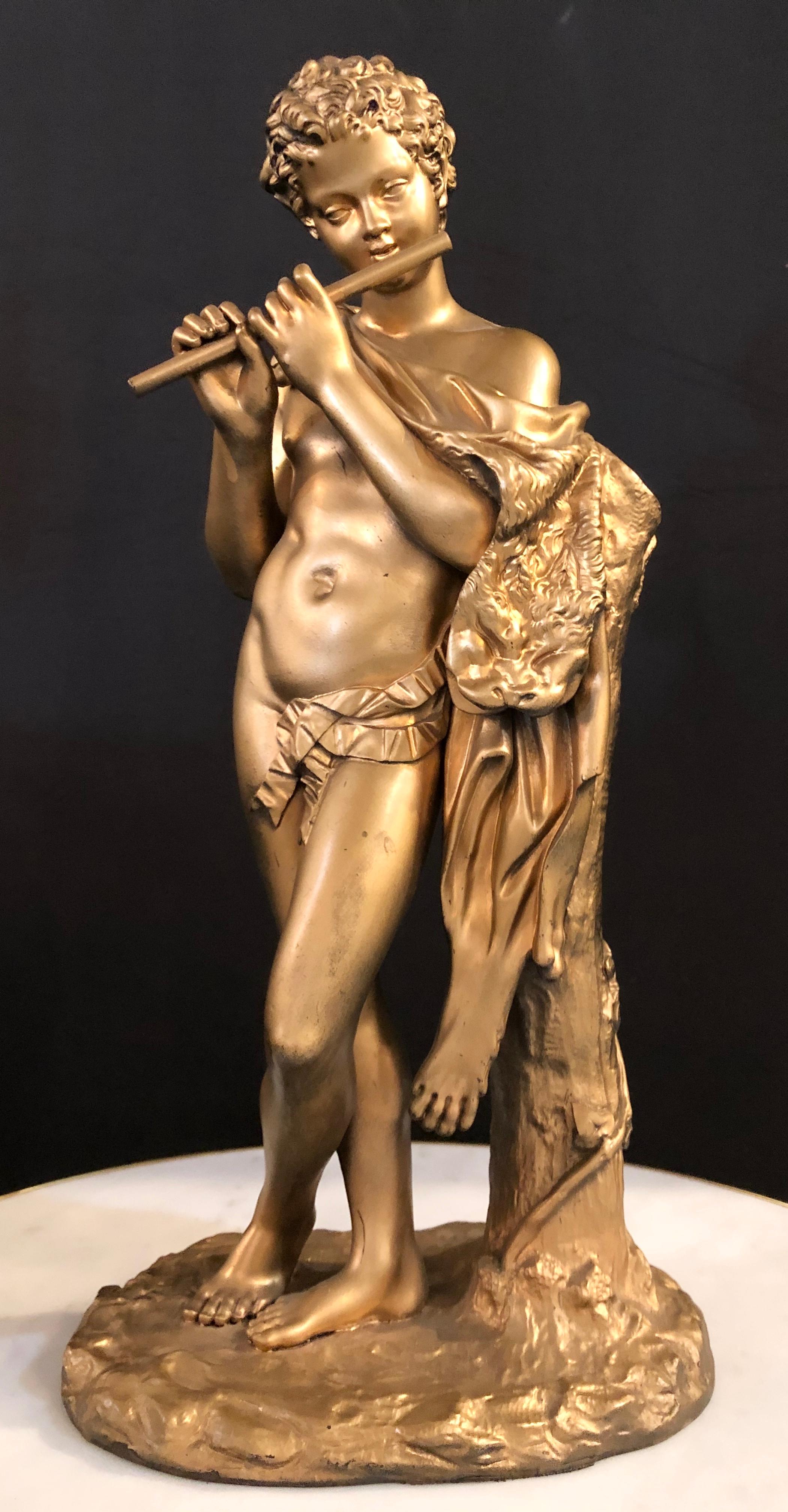 A 19th century bronze Nude Pan Satyr of a Flutist Figure (s.IV a.de C. Musée du Louvre). A highly desirable decorative antique finely cast sculpture of a bronze Man. Satyrs, related to the Maenads, form the 'Dionysian procession' which accompanies