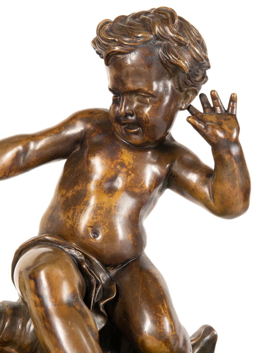 An amusing 19th century patinated bronze study of a child sitting an sea shell, playing with a lobster.
Signed; Pigale

A renowned 17th century sculptor, Jean Baptiste Pigalle (1714-1785) studied in Rome before returning to France, where was