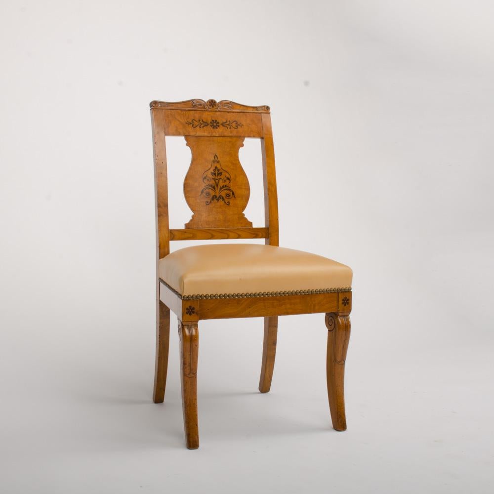 Wood A nineteenth century burlwood chair in the Biedermeier Style