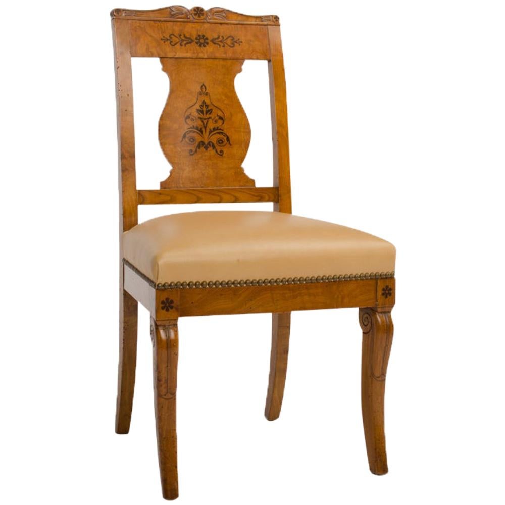 A nineteenth century burlwood chair in the Biedermeier Style