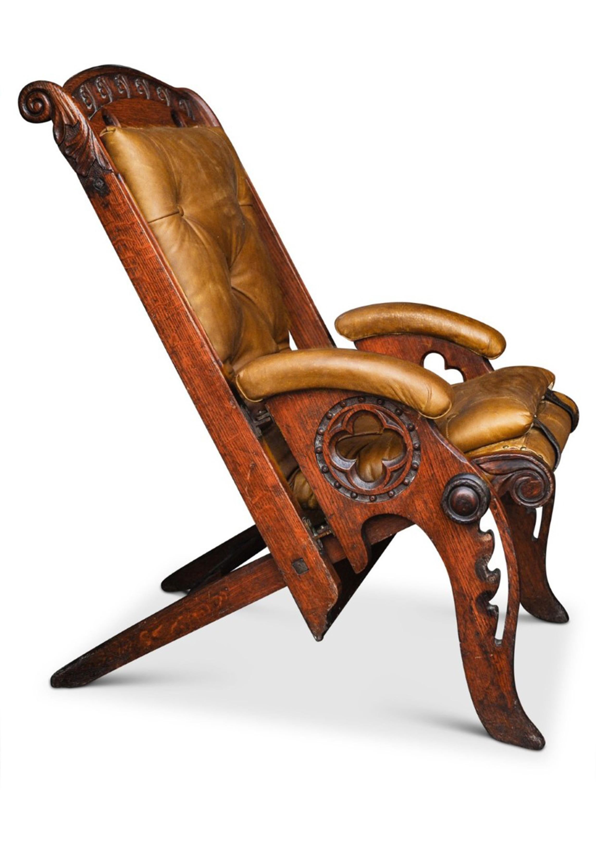 British Colonial 19th Century Campaign Chair Herbert McNair Design Carved Oak and Tan Leather For Sale