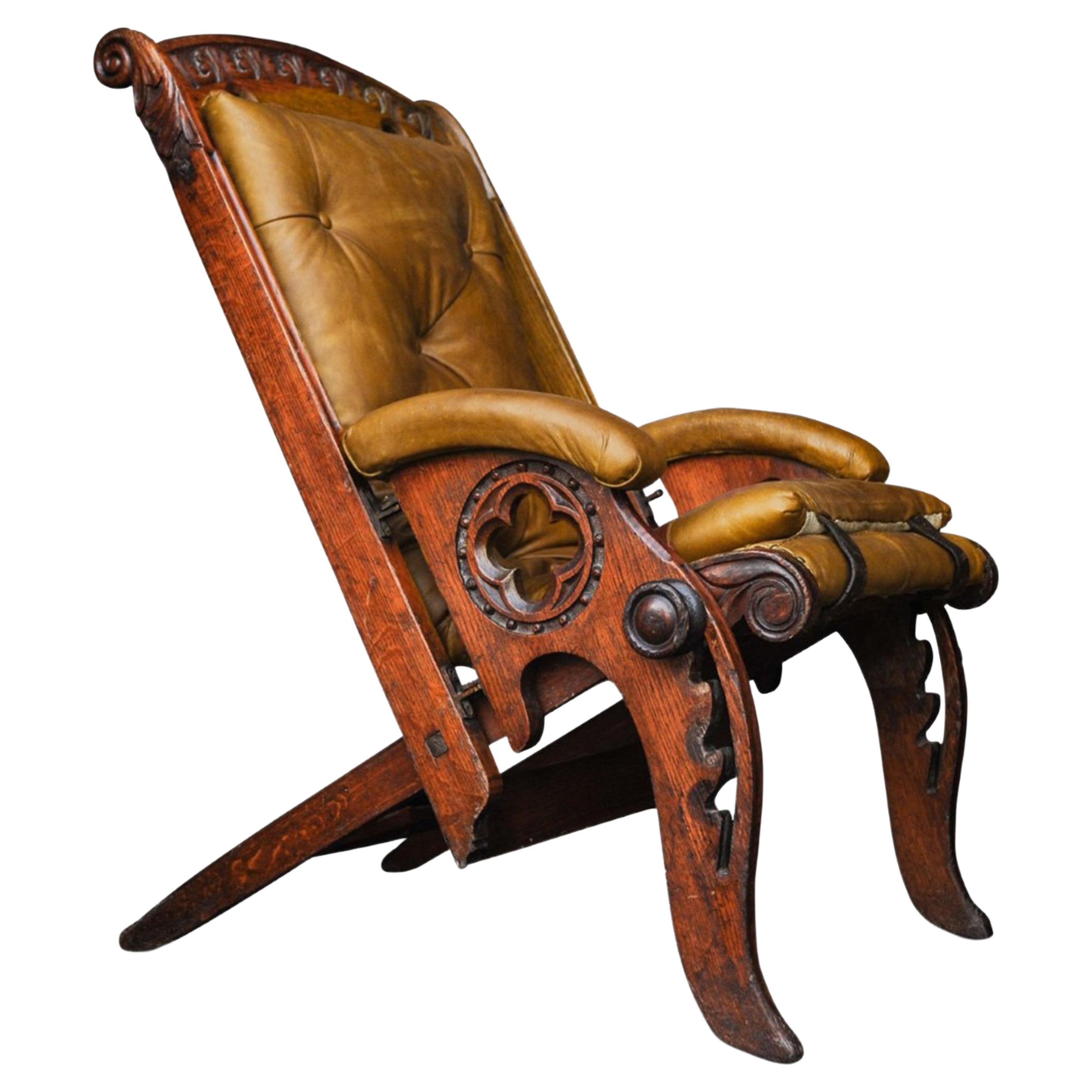 19th Century Campaign Chair Herbert McNair Design Carved Oak and Tan Leather For Sale
