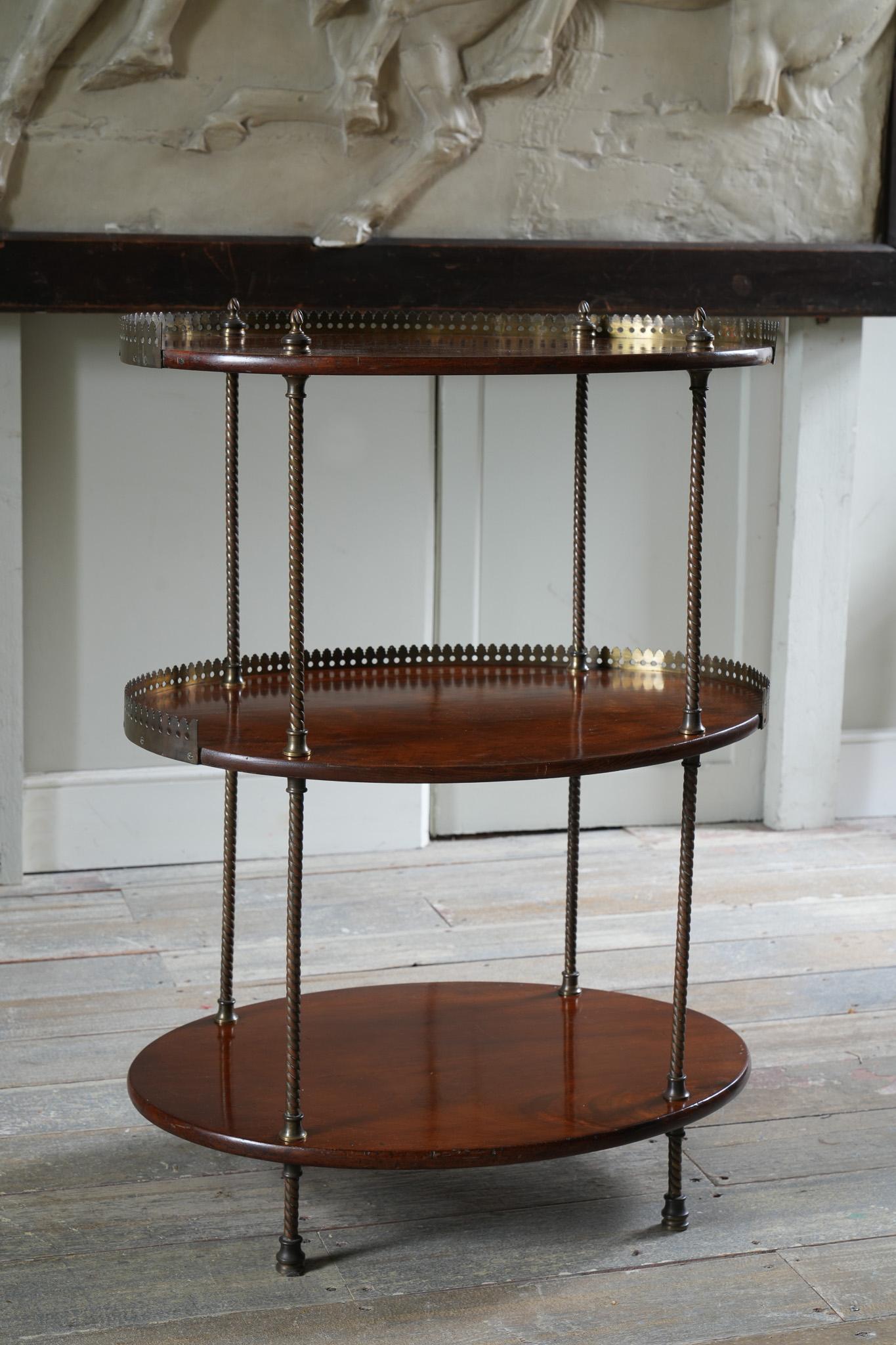 A three tier mahogany and gilt brass portable campaign wash stand.

Rather better than the norm.

Breaks down into nineteen sections.