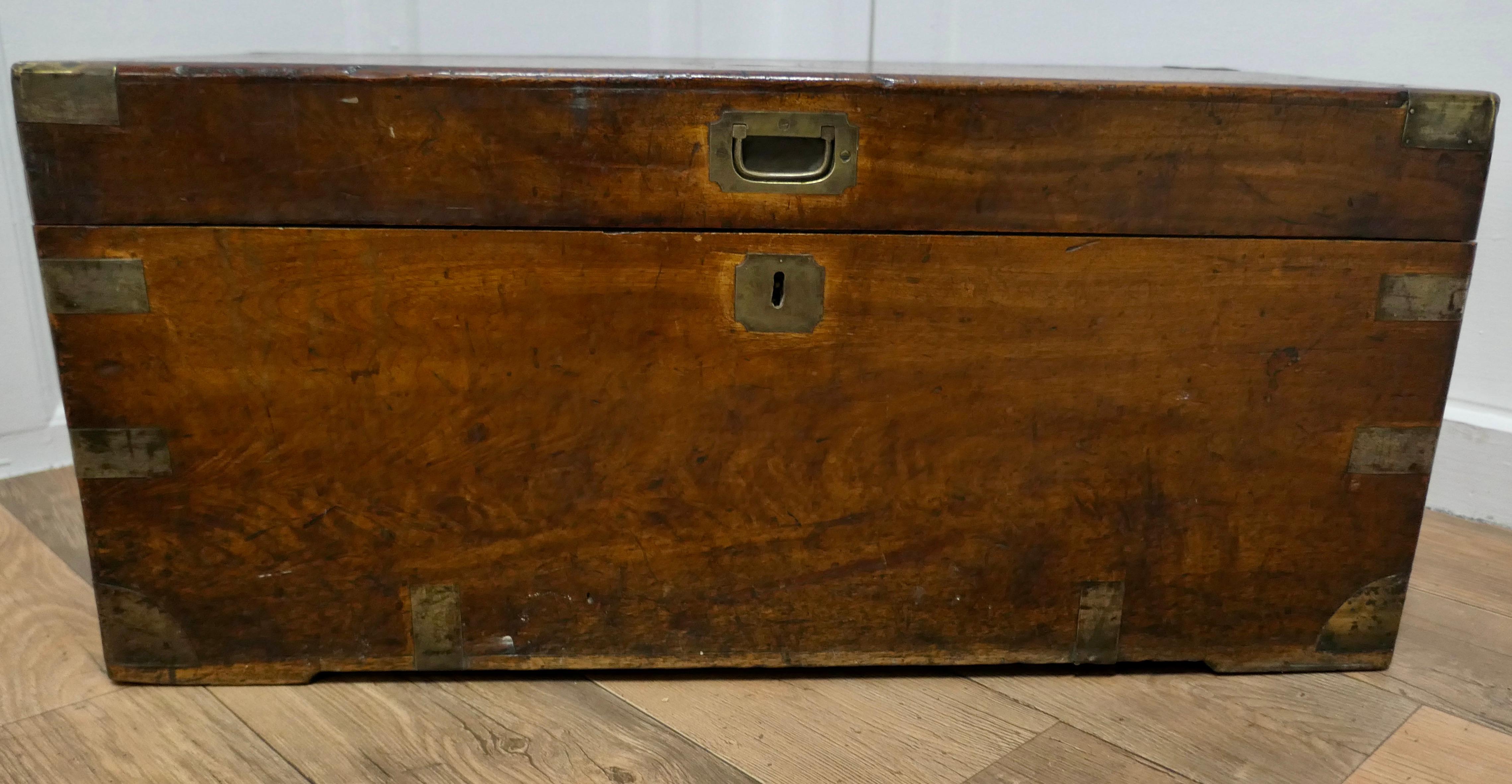 A 19th Century Camphor Wood Campaign Chest, 

This is a beautiful looking and fine quality camphor wood Campaign chest
The Chest has campaign style brass bound corners and edges and brass carrying handles 
This is an attractive piece with a good