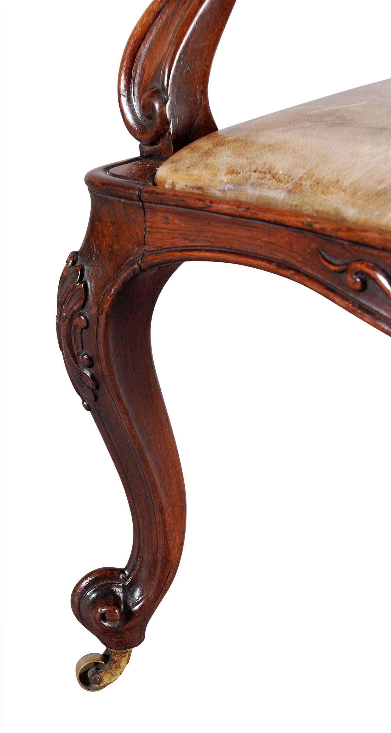 Hand-Carved A 19th Century Carved Rosewood and Leather Armchair For Sale