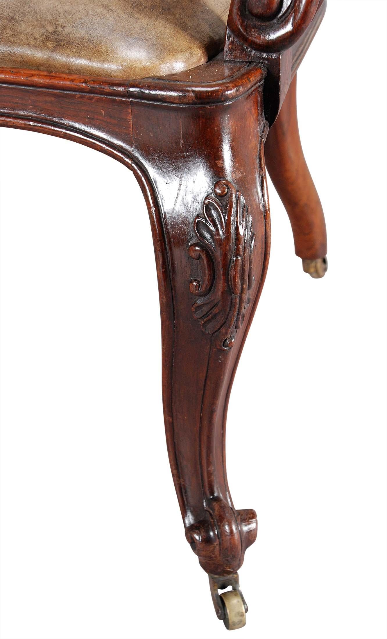 A 19th Century Carved Rosewood and Leather Armchair In Good Condition For Sale In Harrodsburg, KY