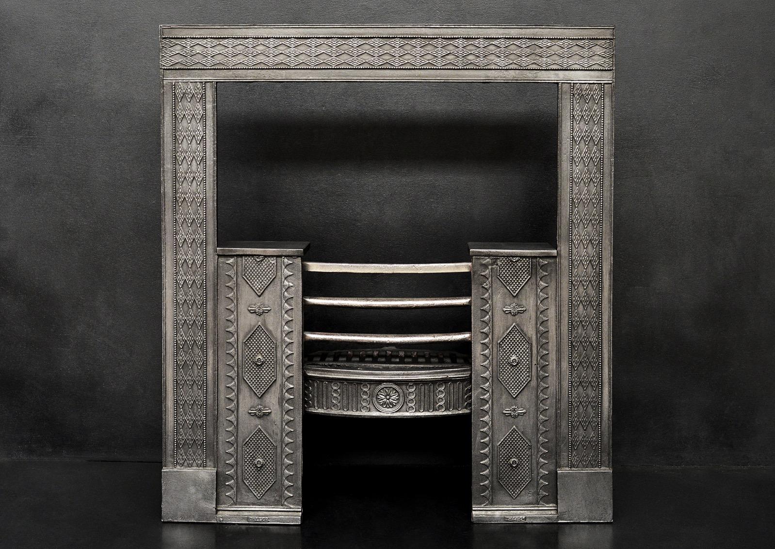 An attractive 19th century cast iron register grate. The diamond design to frame within beaded mouldings, guilloche and patera detailing to fret. Circa 1830. Could be polished if required. (Price includes adding iron interiors if required.)

Width