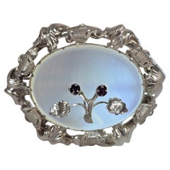 A 19th century chalcedony, amethyst and silver brooch circa 1860