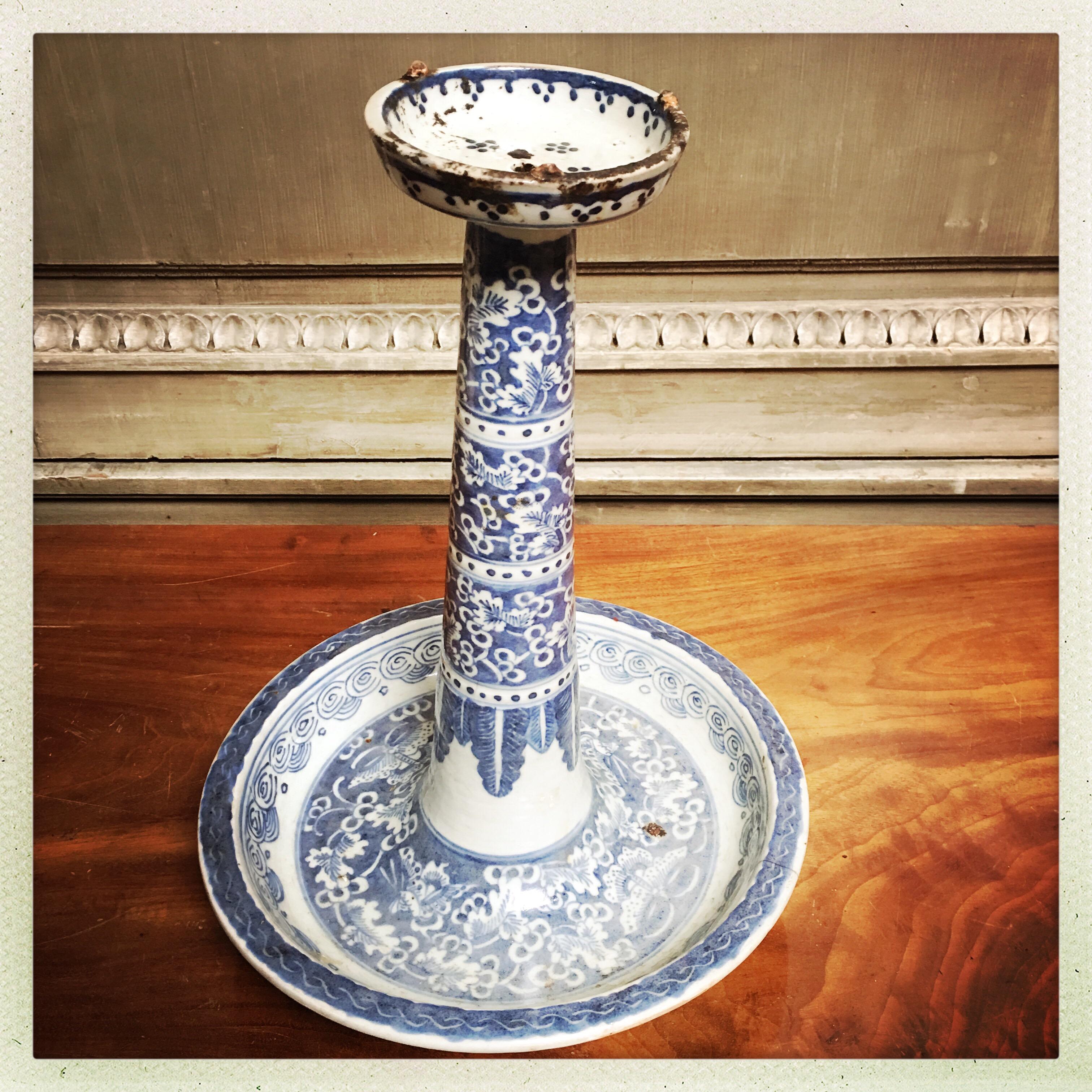 A 19th century Chinese blue and white porcelain candle stand.