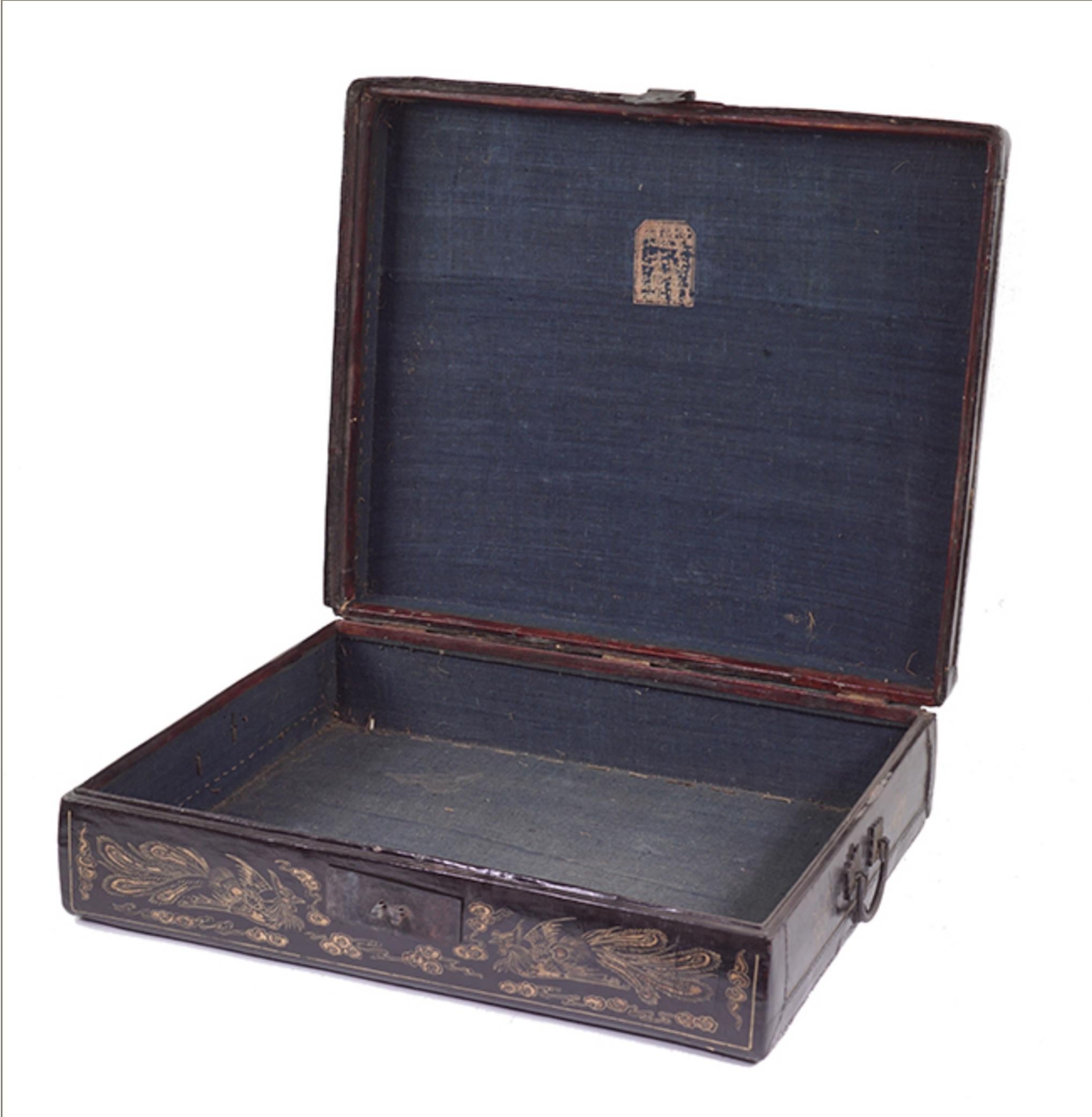A 19th century Chinese box. Black lacquered rectangular double handled box with gilt decoration throughout 7