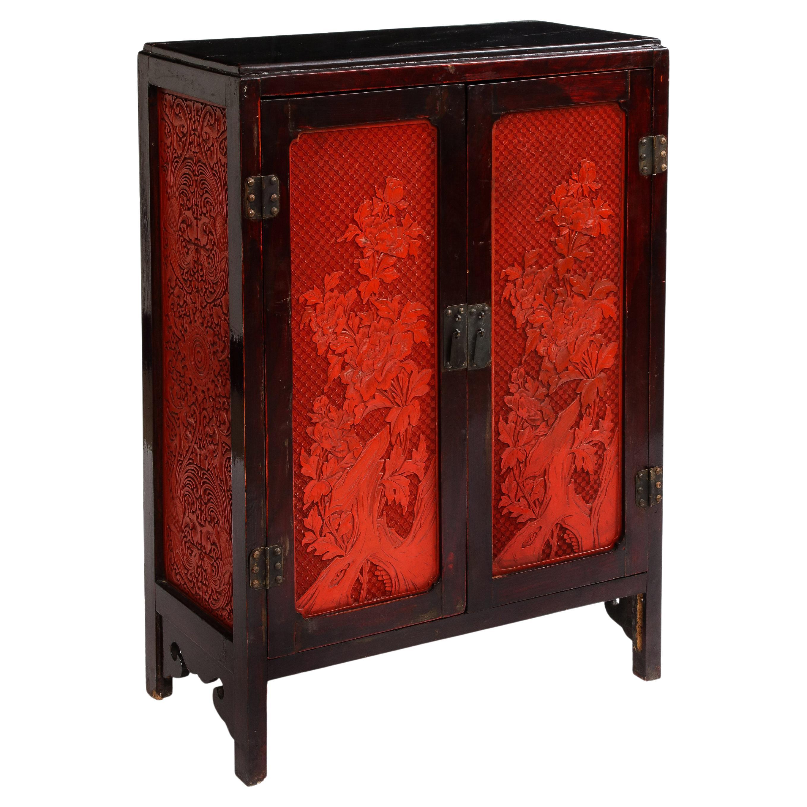A 19th Century Chinese Cinnabar Panel Inlaid Hardwood Cabinet For Sale