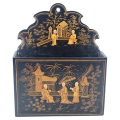 A 19th century Chinese export chinoiserie decorated papier mache  wall pocket.