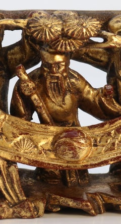 A 19th century Chinese miniature carved giltwood figure group circa 1890