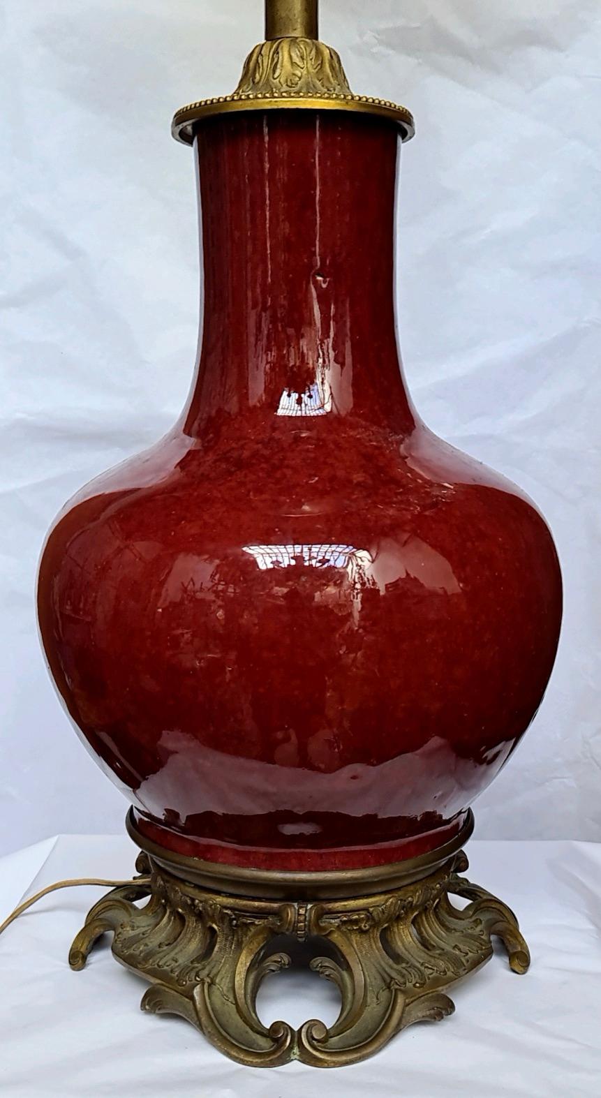 A Chinese Porcelain Sang de Boeuf Baluster vase
Ormolu-mounted in lamp
Original gilding
Louis XV style
circa 1880
Vase height 41 cm 16.15 in.



   